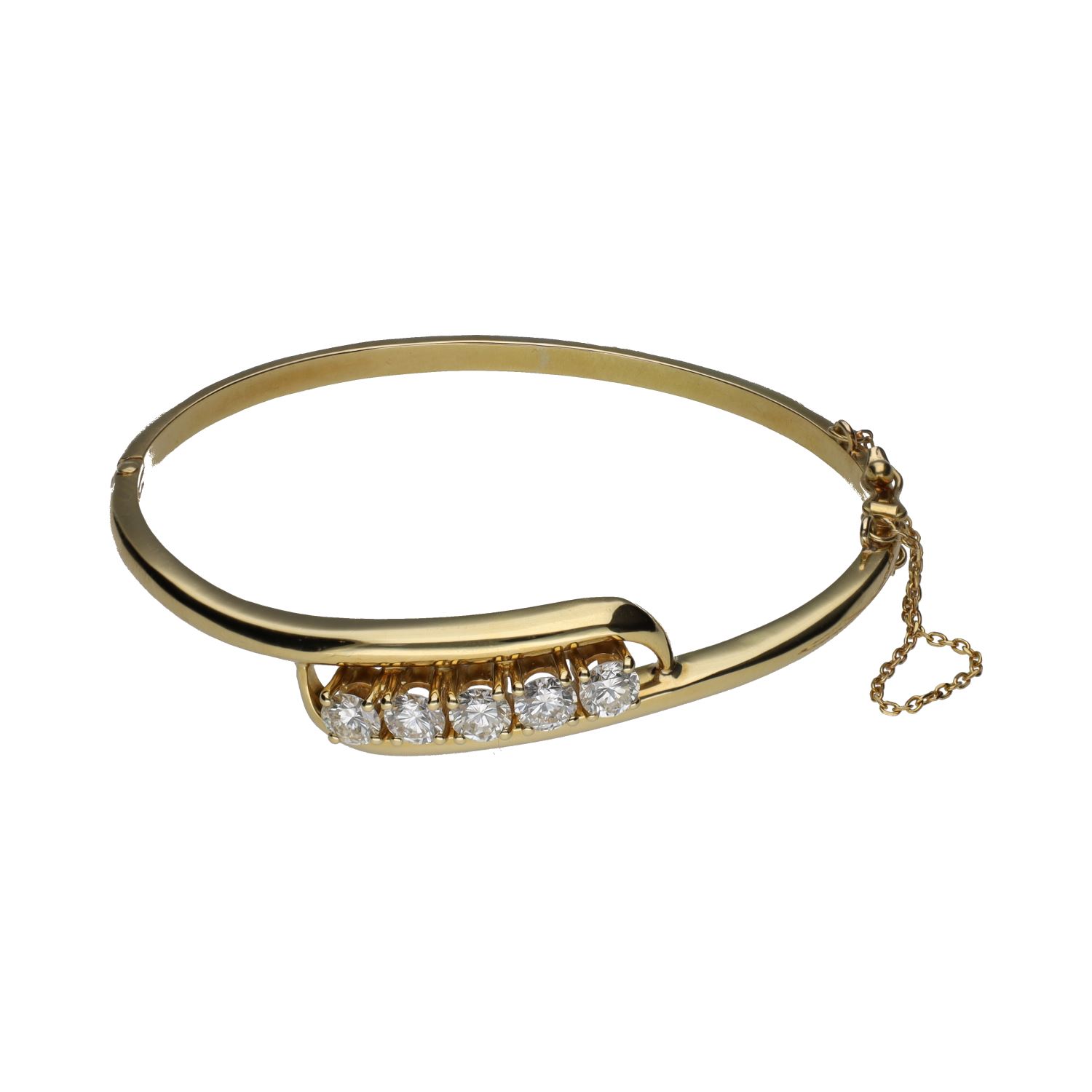 Pulsera rígida en oro amarillo con cinco brillantes.